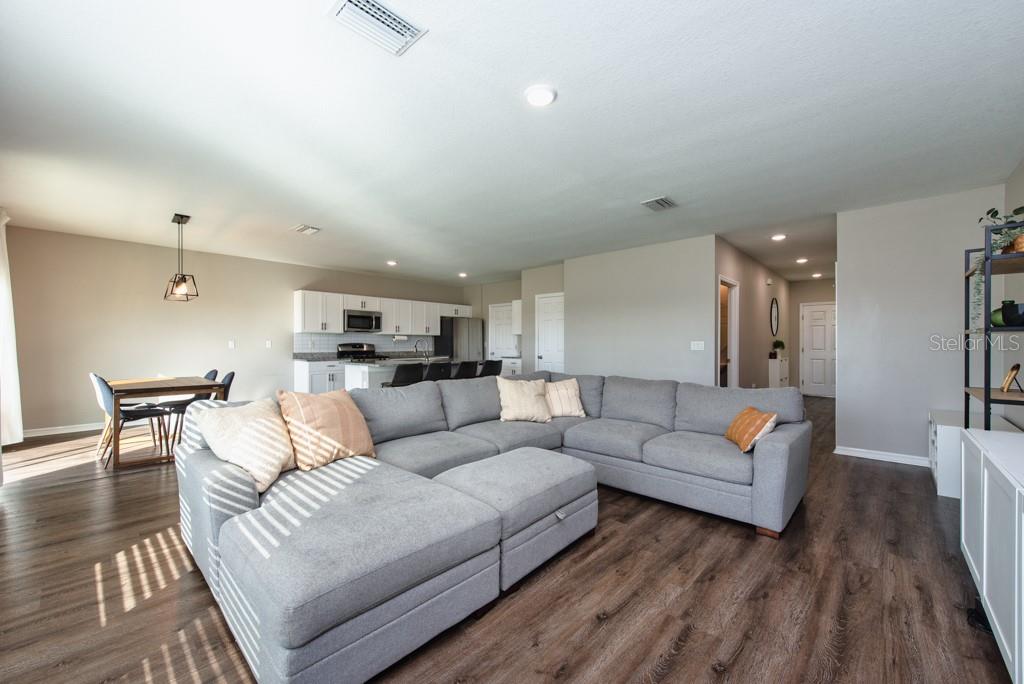 14617 Brumby Ridge Avenue Lithia, FL 33547 - Photo 8 of 46 a living room with furniture and a couch