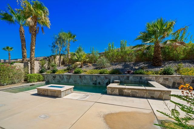 a view of a garden with a bench