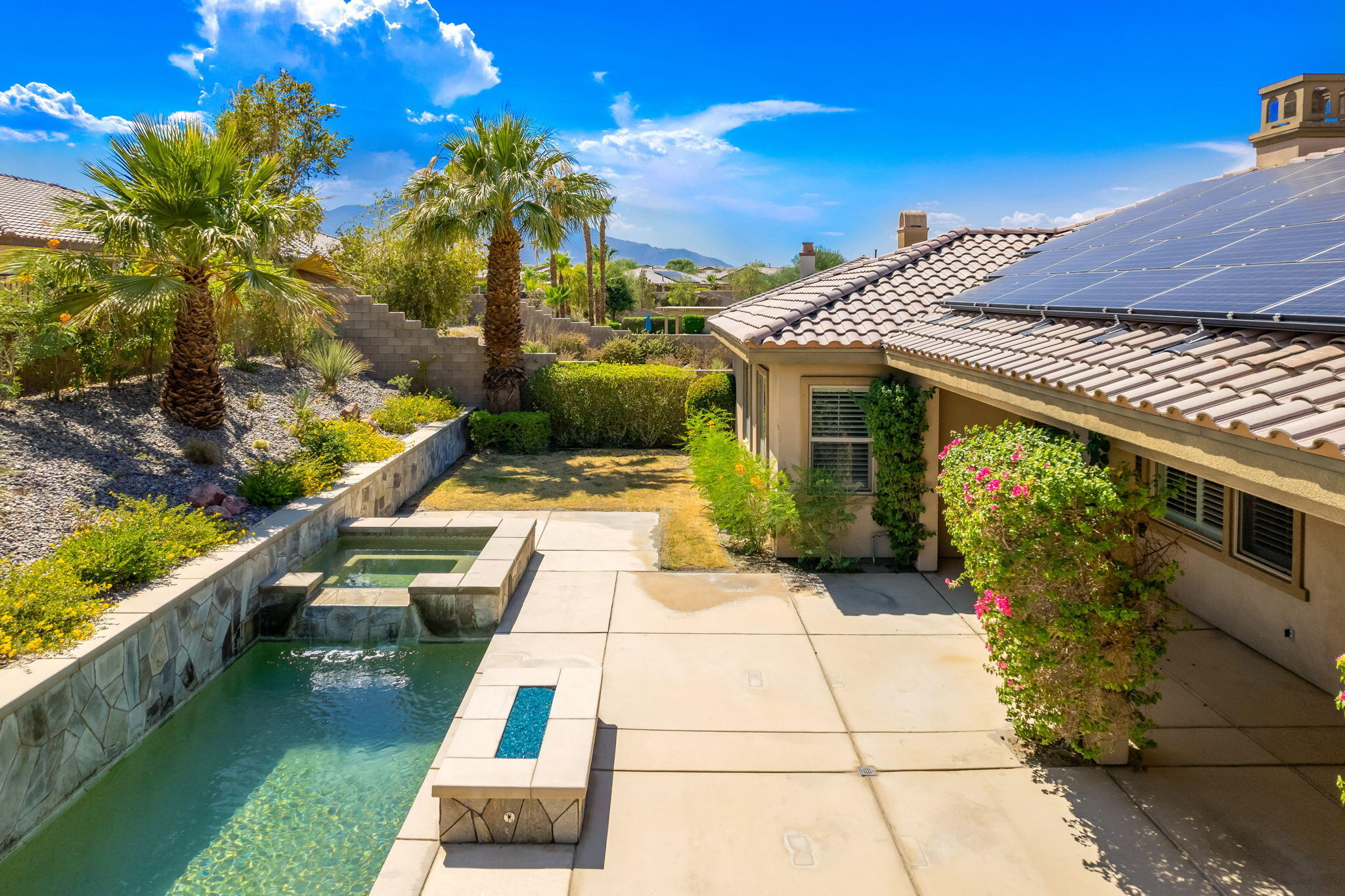 35789 Raphael Drive Palm Desert, CA 92211 - Photo 15 of 15 a front view of a house with a yard