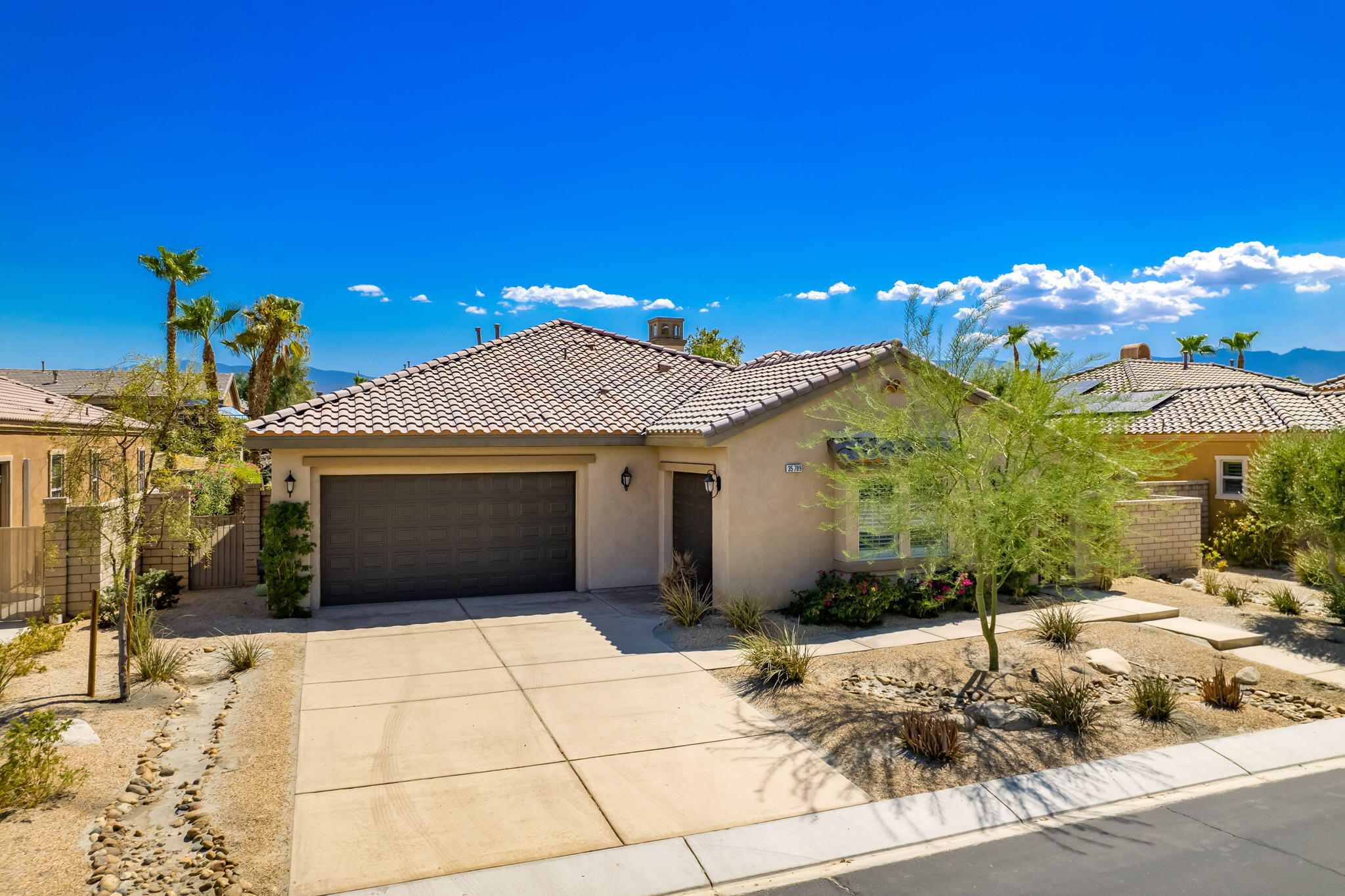 35789 Raphael Drive Palm Desert, CA 92211 - Photo 2 of 15 a view of a house with a porch