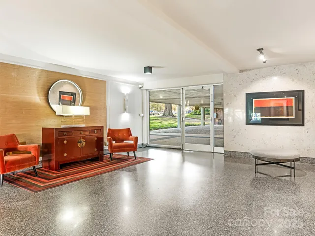 a view of a street in front of a building