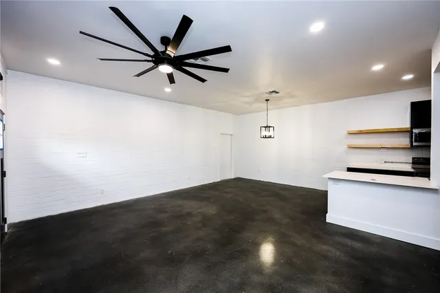 a view of a kitchen with a sink and dishwasher