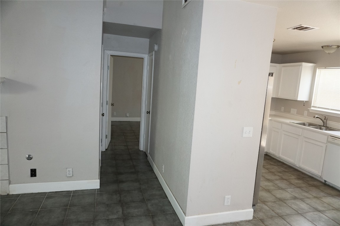 21218 Derby Day Avenue Pflugerville, TX 78660 - Photo 5 of 17 a bathroom with a sink and a mirror
