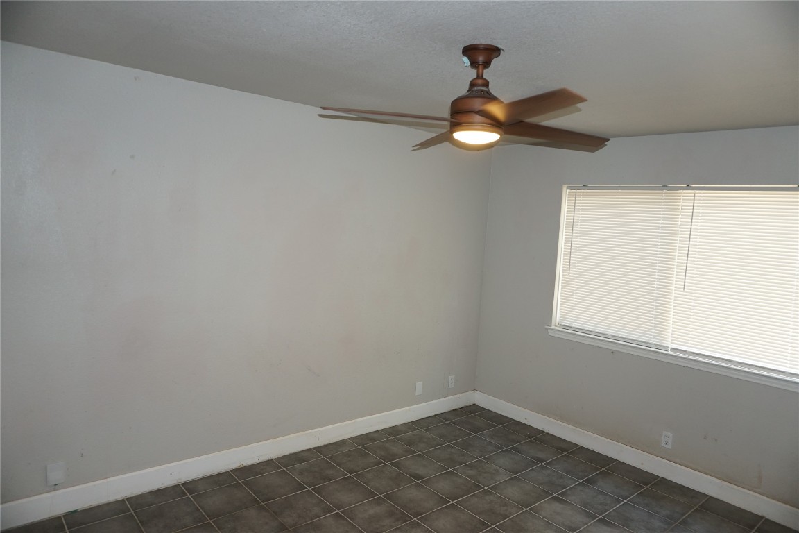 21218 Derby Day Avenue Pflugerville, TX 78660 - Photo 7 of 17 a view of empty room with window