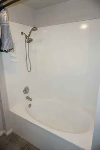 a bathroom with a bathtub