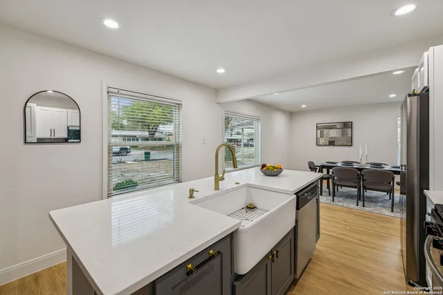 a room with furniture and a wooden floor