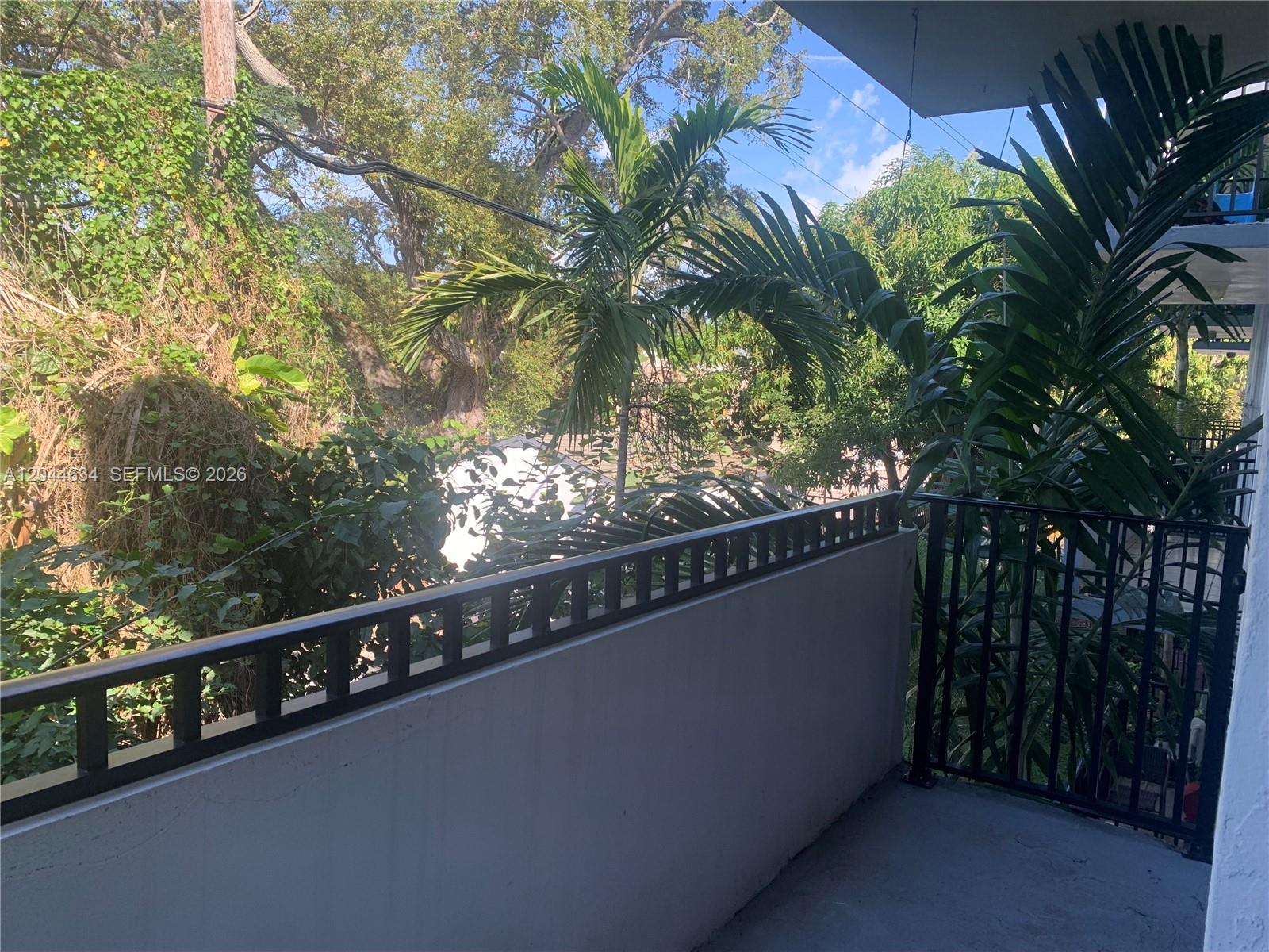 2460 Southwest 18th Avenue, Unit 1205 Miami, FL 33133 - Photo 11 of 21 a view of balcony with furniture