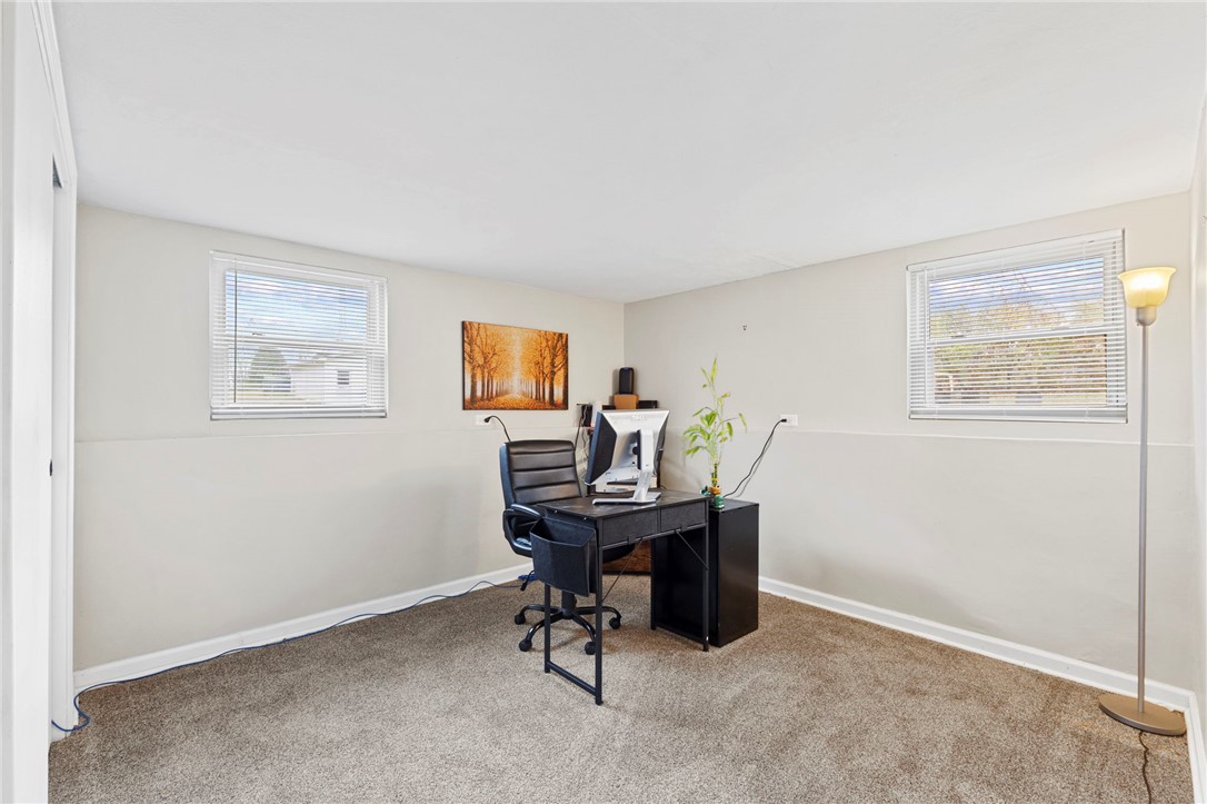 8180 Manning Road Germantown, OH 45327 - Photo 26 of 39 This spacious room offers ample natural light, ideal for a productive home office or creative space.