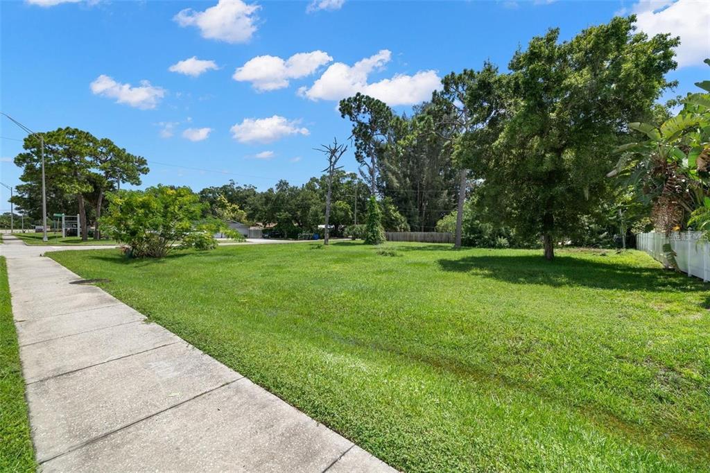 5670 Roosevelt Boulevard, Unit 4 Clearwater, FL 33760 - Photo 6 of 14 a view of a park with large trees