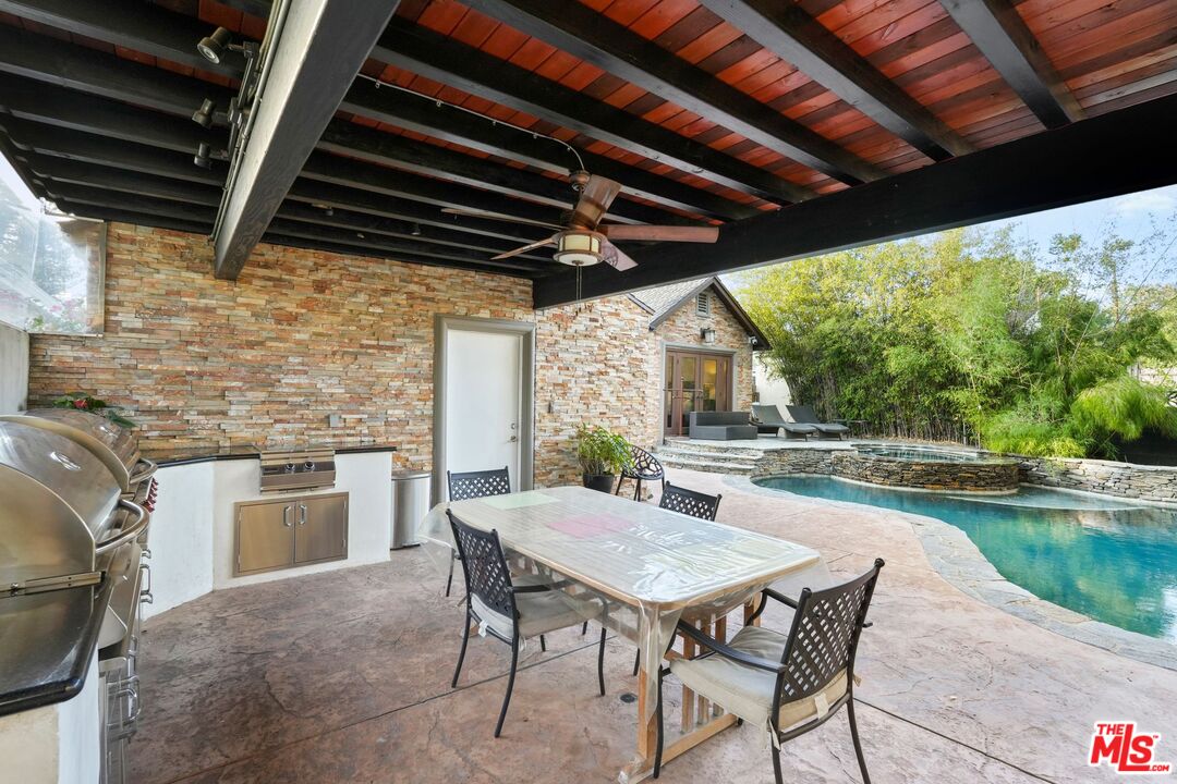5324 Irvine Avenue Valley Village, CA 91601 - Photo 27 of 33 a outdoor dining space with furniture and garden view