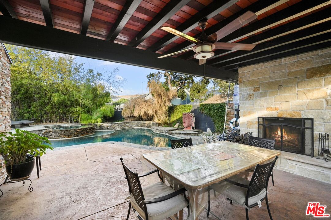 5324 Irvine Avenue Valley Village, CA 91601 - Photo 28 of 33 a patio with water view fountain with a garden view