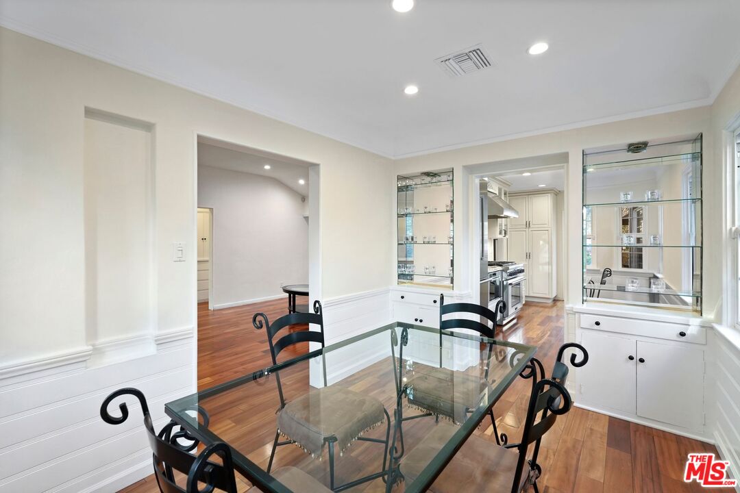 5324 Irvine Avenue Valley Village, CA 91601 - Photo 7 of 33 a view of a dining room with furniture and window