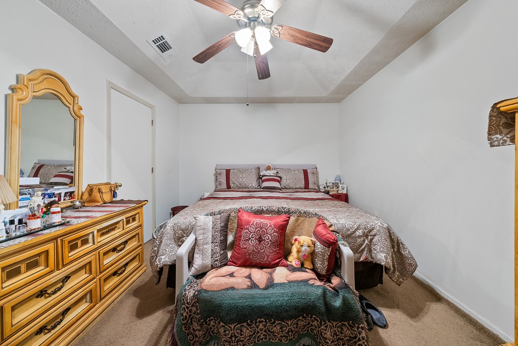 6223 Georgetown Drive Columbus, GA 31907 - Photo 20 of 29 a bedroom with a bed and dresser