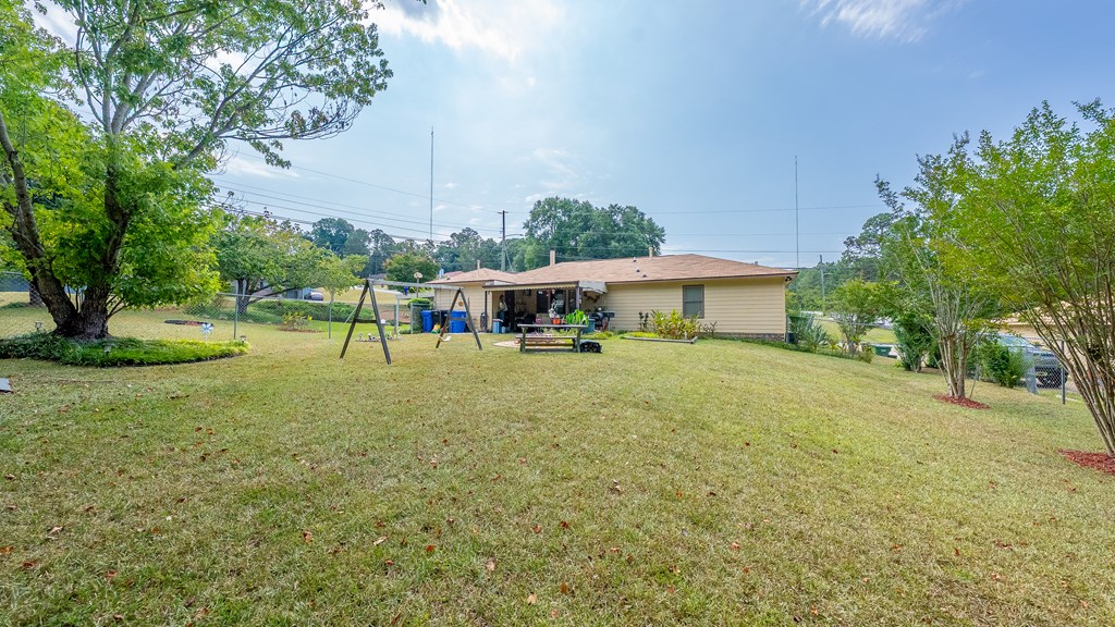 6223 Georgetown Drive Columbus, GA 31907 - Photo 27 of 29 a view of house with outdoor space and garden