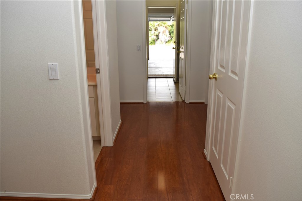 39723 Clements Way Murrieta, CA 92563 - Photo 15 of 20 a view of hallway with wooden floor