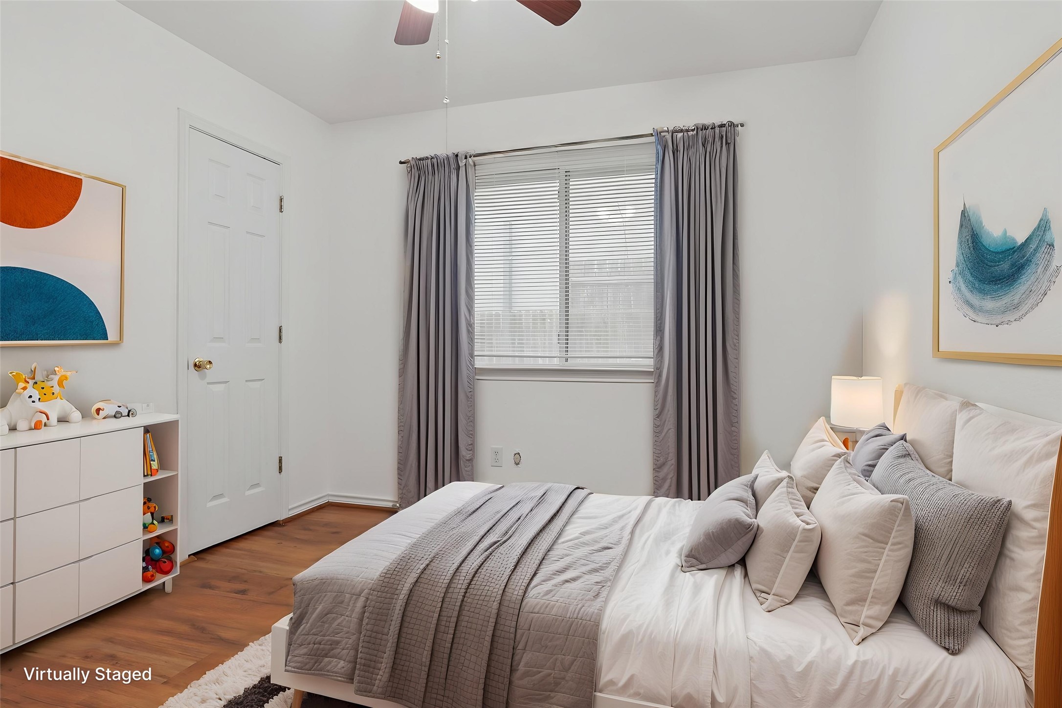 12319 Turtle Rock Road, Unit B Austin, TX 78729 - Photo 12 of 26 a bedroom with a bed and a window