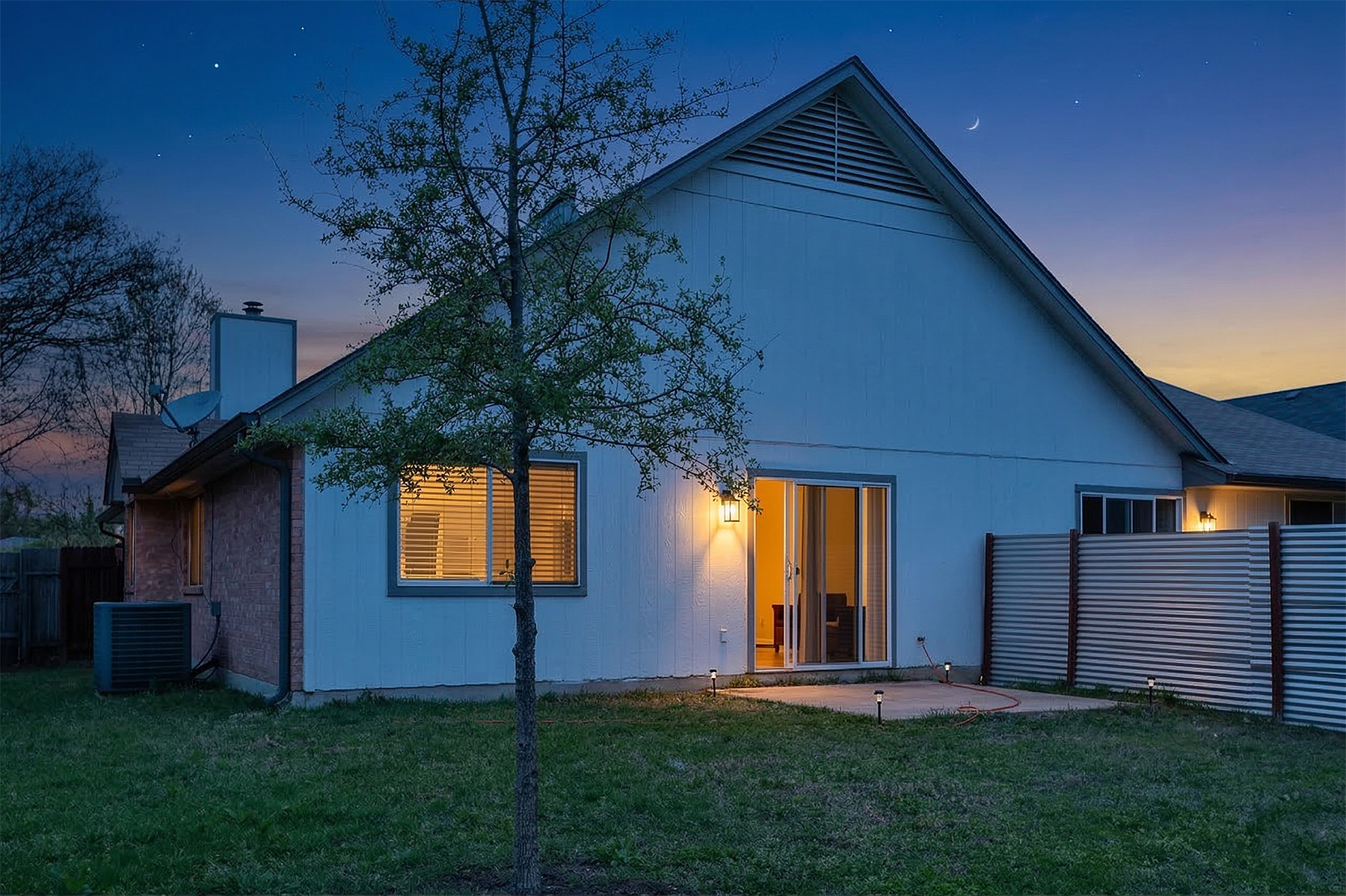 12319 Turtle Rock Road, Unit B Austin, TX 78729 - Photo 2 of 26 a front view of house with a garden