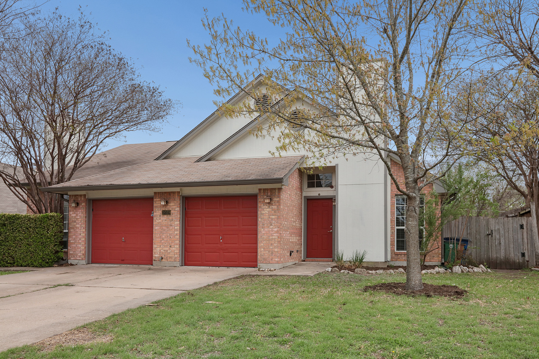 12319 Turtle Rock Road, Unit B Austin, TX 78729 - Photo 5 of 26 a front view of house with yard