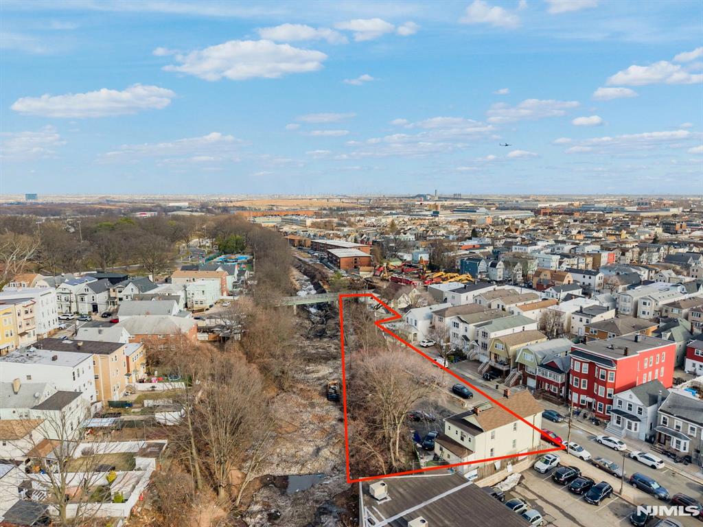 416 Scott-Mobus Place Harrison, NJ 07029 - Photo 2 of 8 an aerial view of a city