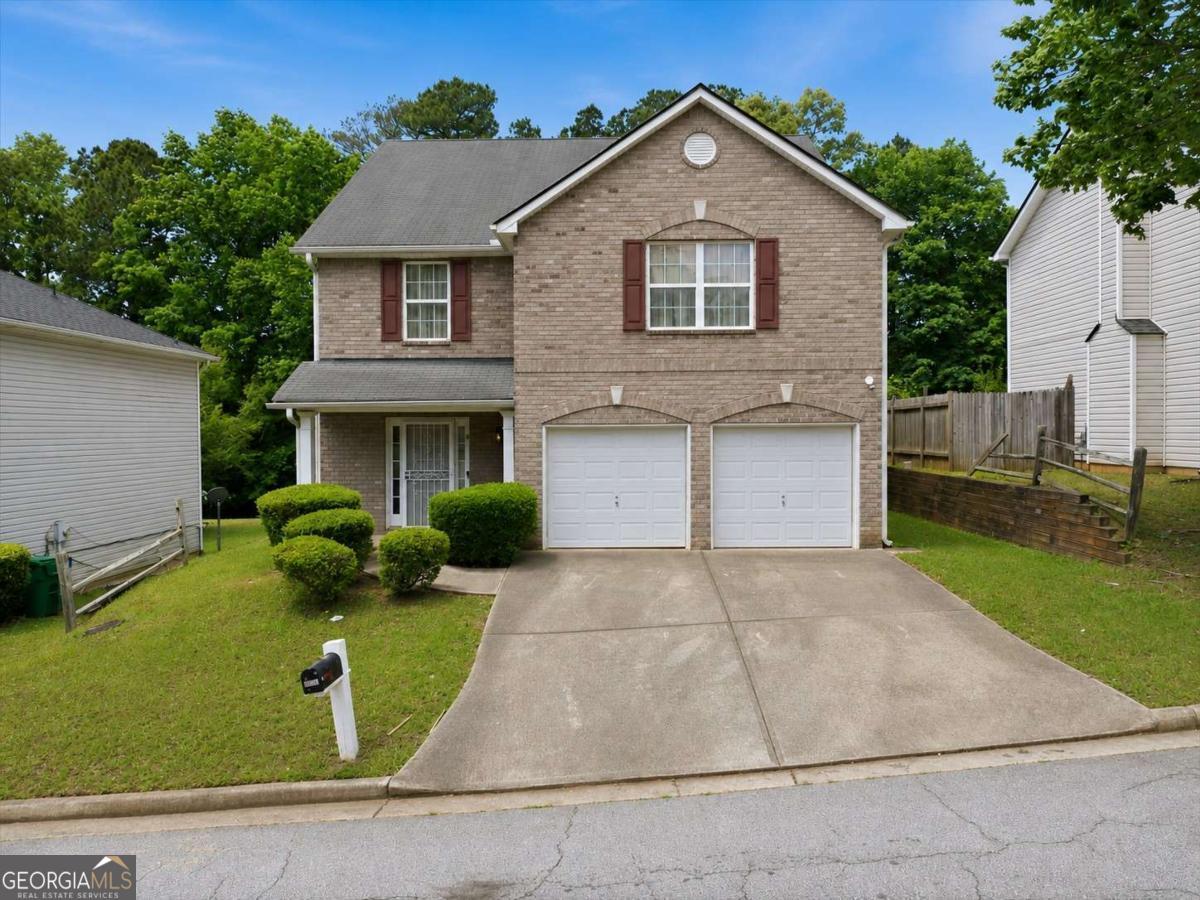 3867 Riverside Parkway Decatur, GA 30034 - Photo 2 of 23 front view of house with a yard