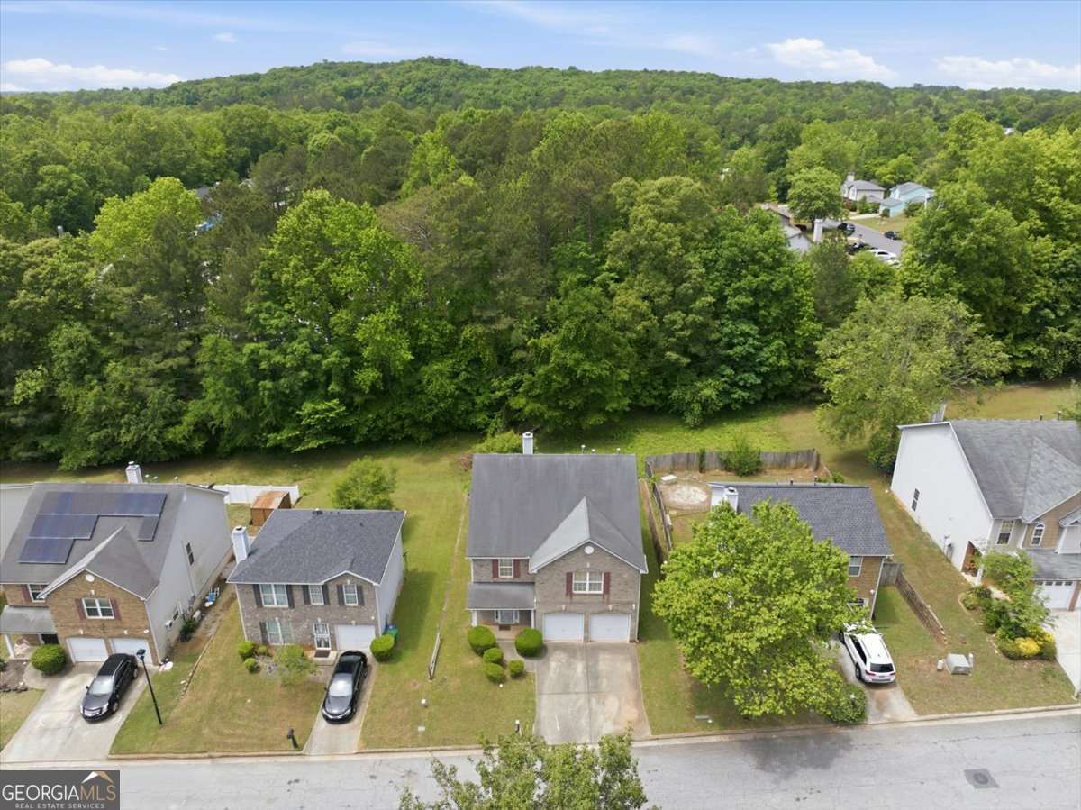 3867 Riverside Parkway Decatur, GA 30034 - Photo 22 of 23 an aerial view of residential houses with outdoor space and trees