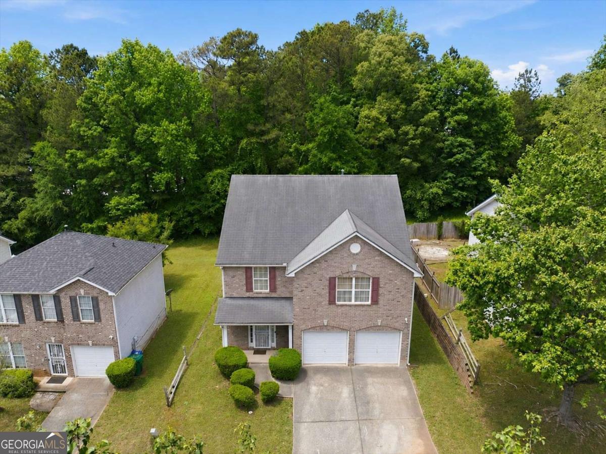 3867 Riverside Parkway Decatur, GA 30034 - Photo 3 of 23 a aerial view of a house with a yard