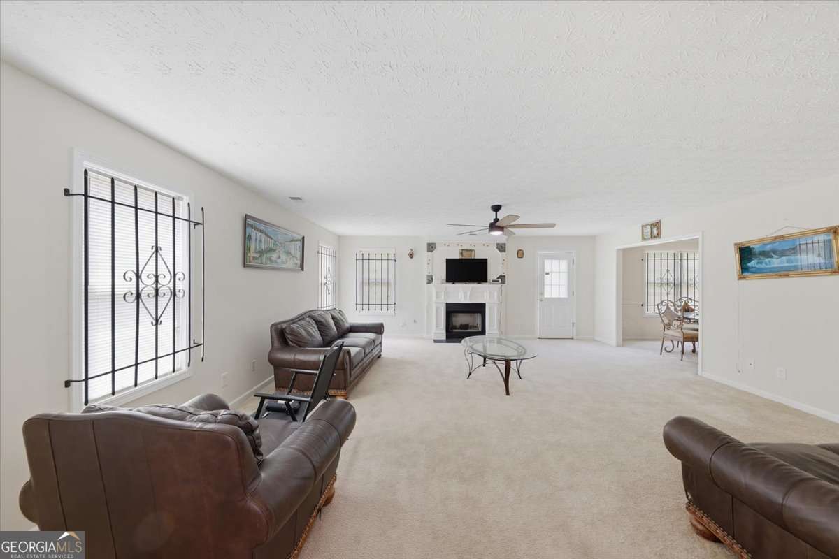 3867 Riverside Parkway Decatur, GA 30034 - Photo 7 of 23 a living room with furniture large window and flat screen tv