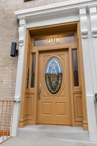 a close view of a utility room with dryer and washer