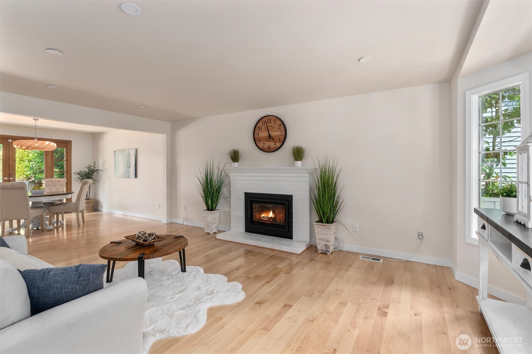 2101 233rd Street Southeast Bothell, WA 98021 - Photo 4 of 40 a living room with furniture and a fireplace