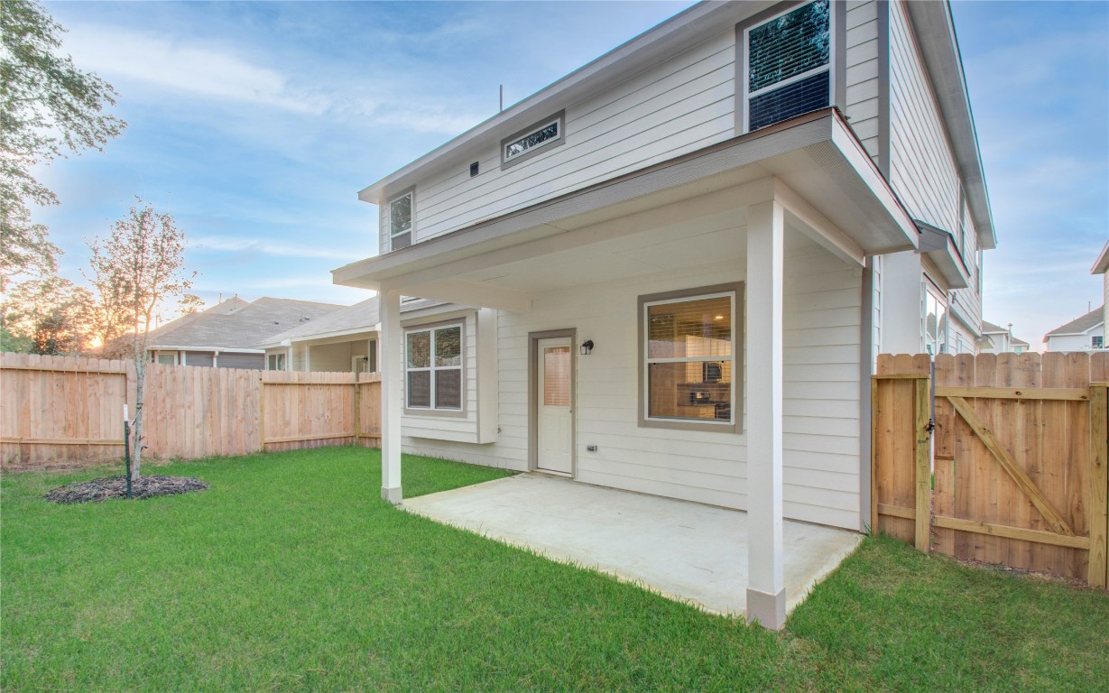 3620 Cub Drive Conroe, TX 77301 - Photo 35 of 49 a view of an house with backyard and a garden