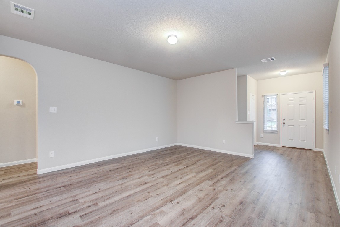 3620 Cub Drive Conroe, TX 77301 - Photo 8 of 49 a view of an empty room with wooden floor