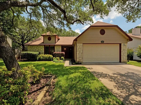 a front view of house with yard