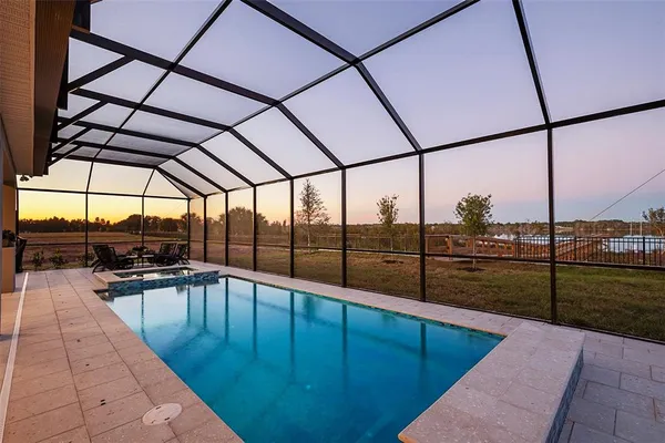 a view of a balcony with chairs