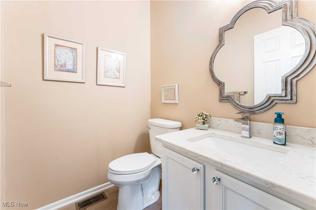 2444 Charing Cross Road Northwest Canton, OH 44708 - Photo 21 of 40 Bathroom featuring vanity and toilet