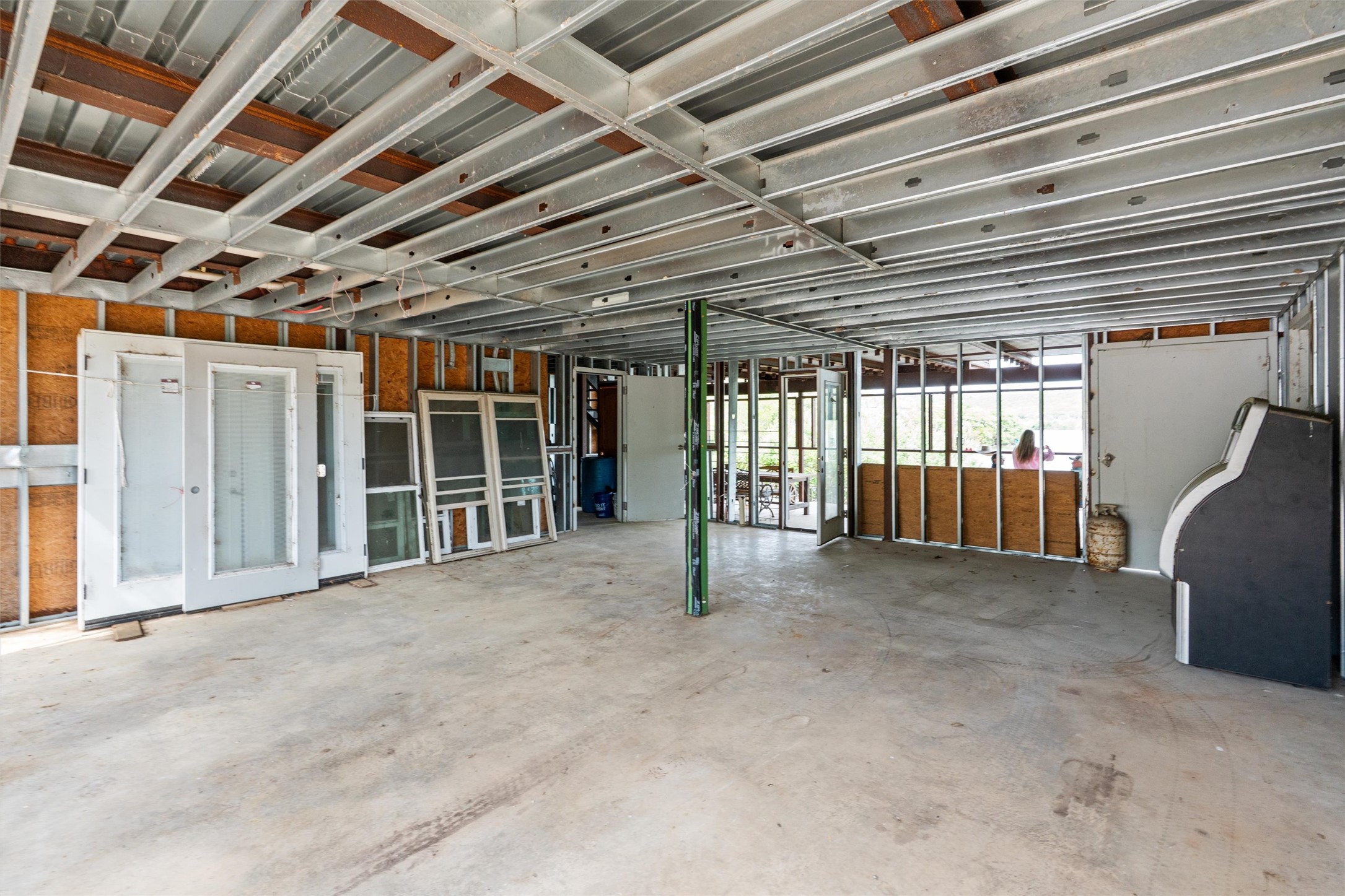 325 Eagle Rest Burnet, TX 78611 - Photo 34 of 40 A spacious, unfinished basement offers endless possibilities for customization and future expansion.