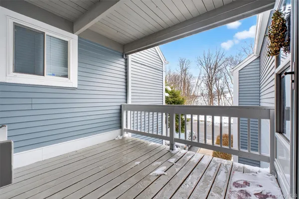 a view of a two chairs on the deck