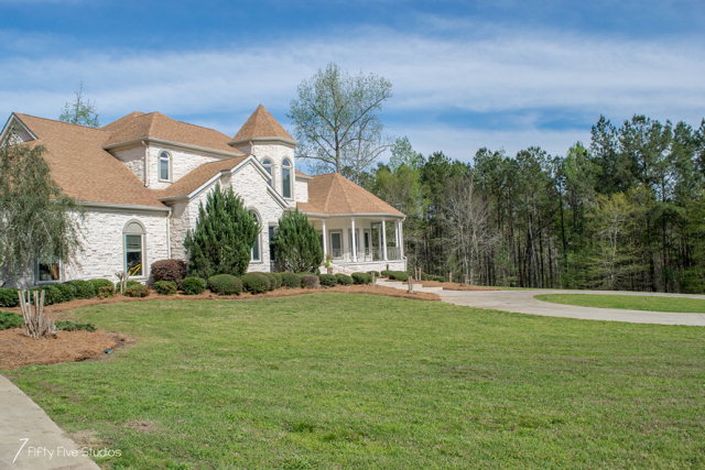 236 Ridge Crest Drive Macon, GA 31210 - Photo 5 of 33 a front view of a house with a garden and trees