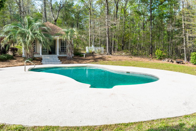 236 Ridge Crest Drive Macon, GA 31210 - Photo 8 of 33 a view of a swimming pool with a patio