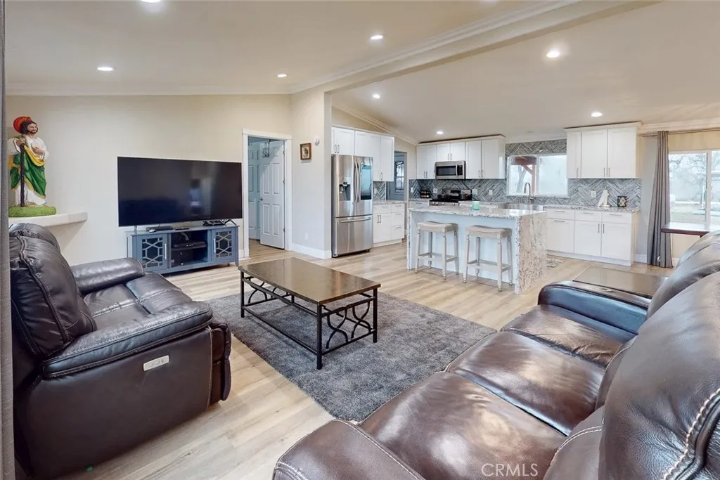 3453 La Porte Road Oroville, CA 95966 - Photo 12 of 69 a living room with furniture and a flat screen tv