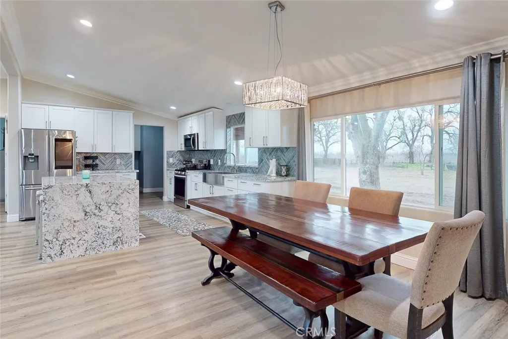3453 La Porte Road Oroville, CA 95966 - Photo 17 of 69 a view of a dining room with furniture window and wooden floor