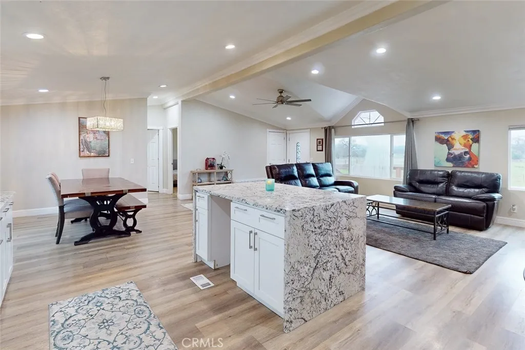 3453 La Porte Road Oroville, CA 95966 - Photo 20 of 69 a living room with furniture and a dining table with kitchen view