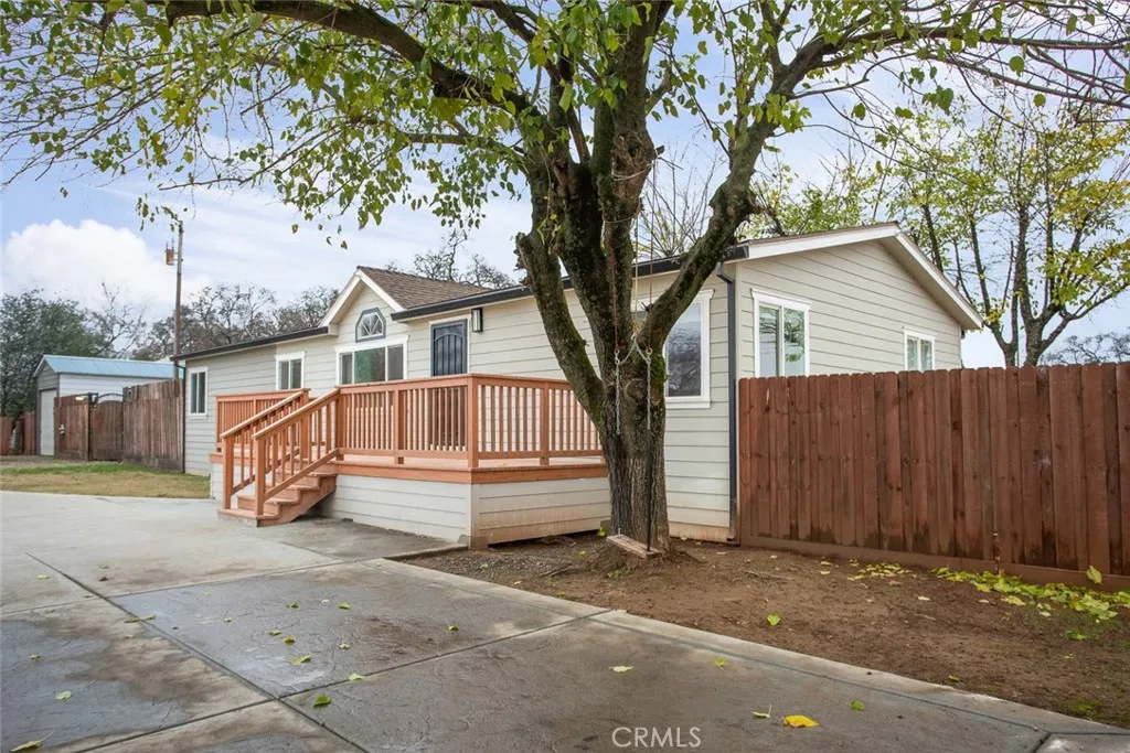 3453 La Porte Road Oroville, CA 95966 - Photo 36 of 69 a white house that has a tree in front of it
