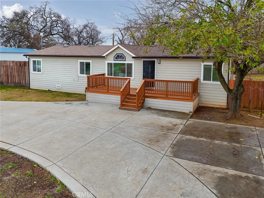 3453 La Porte Road Oroville, CA 95966 - Photo 64 of 69 a view of a house with a backyard and a tree