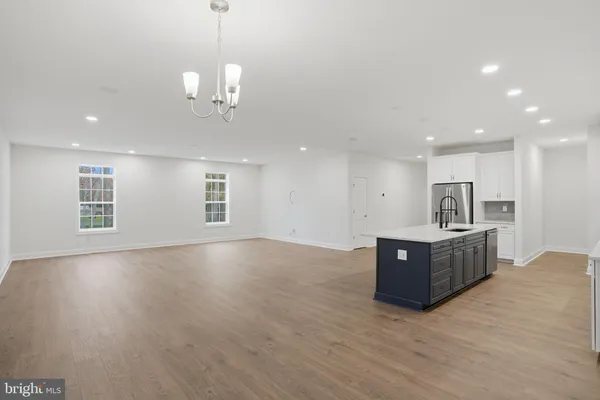 a view of kitchen and sink