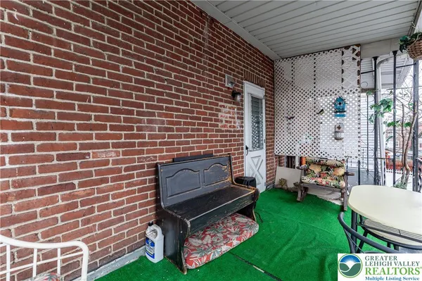 a backyard of a house with a garden