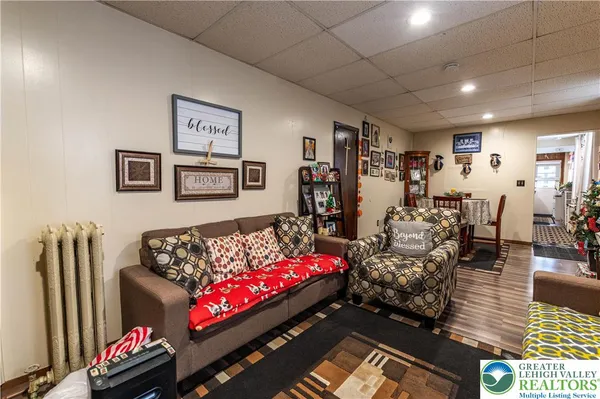 a bedroom with furniture and a couch