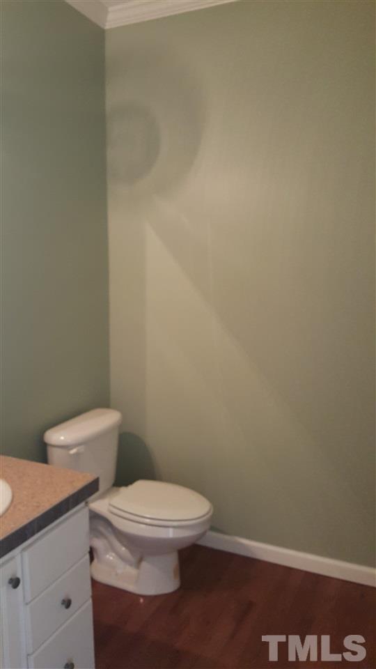 304 Dirgie Mine Road Roxboro, NC 27574 - Photo 14 of 25 a white toilet sitting next to a white wall