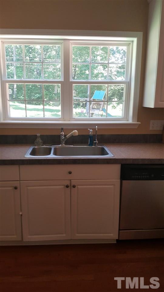 304 Dirgie Mine Road Roxboro, NC 27574 - Photo 4 of 25 a close view of sink and cabinets