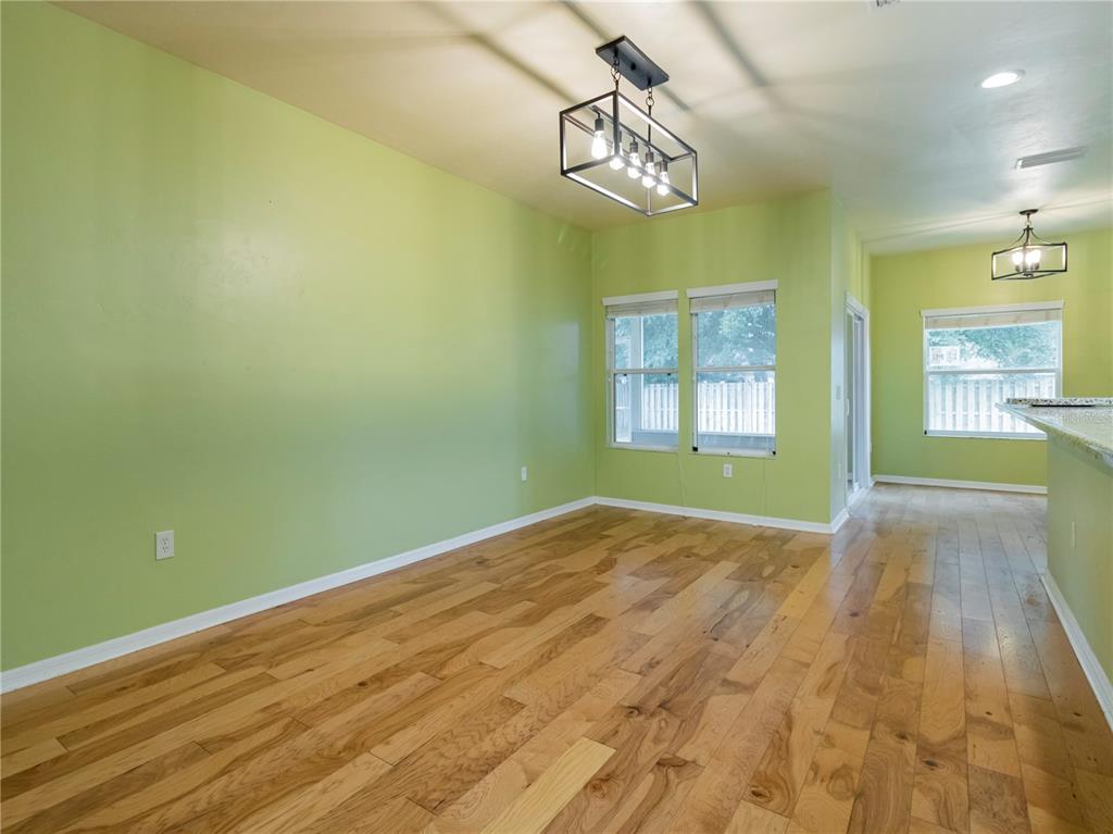 8436 Southwest 77th Avenue Gainesville, FL 32608 - Photo 5 of 21 a view of empty room with windows