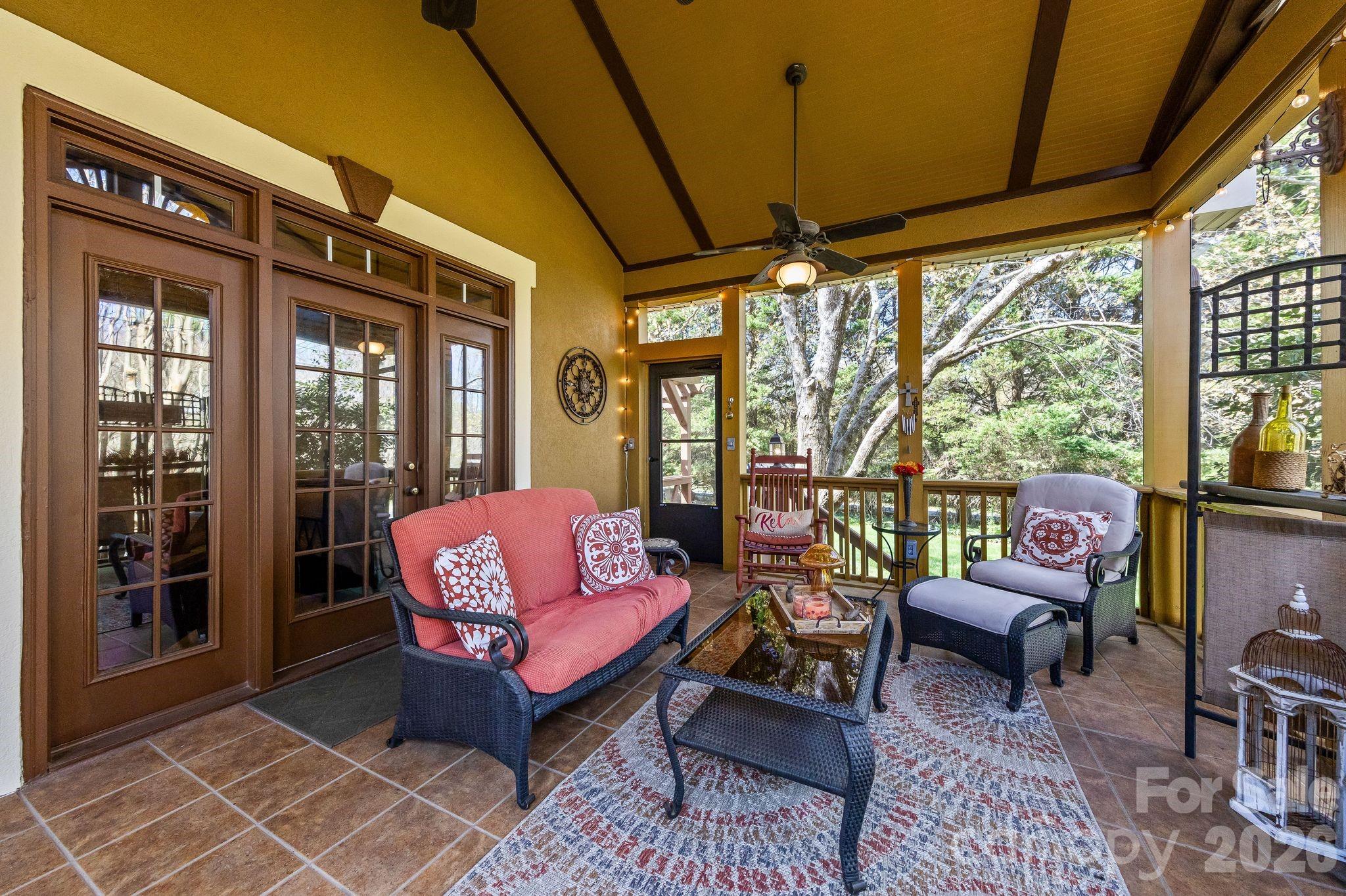 3530 Cardiff Lane Matthews, NC 28104 - Photo 22 of 39 a outdoor living space with furniture and a potted plant